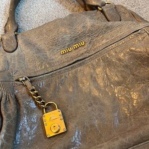 Vintage Miu Miu tan leather purses very worn with gold hardware shoulder bag